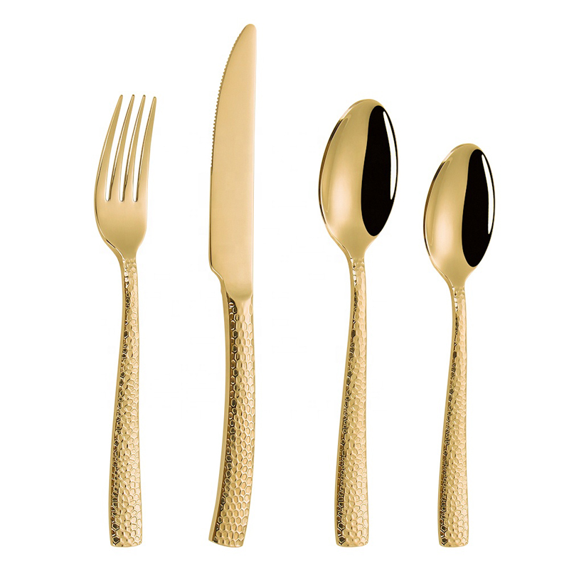 kreativ design af skinnende guld bestik af spiseartikler